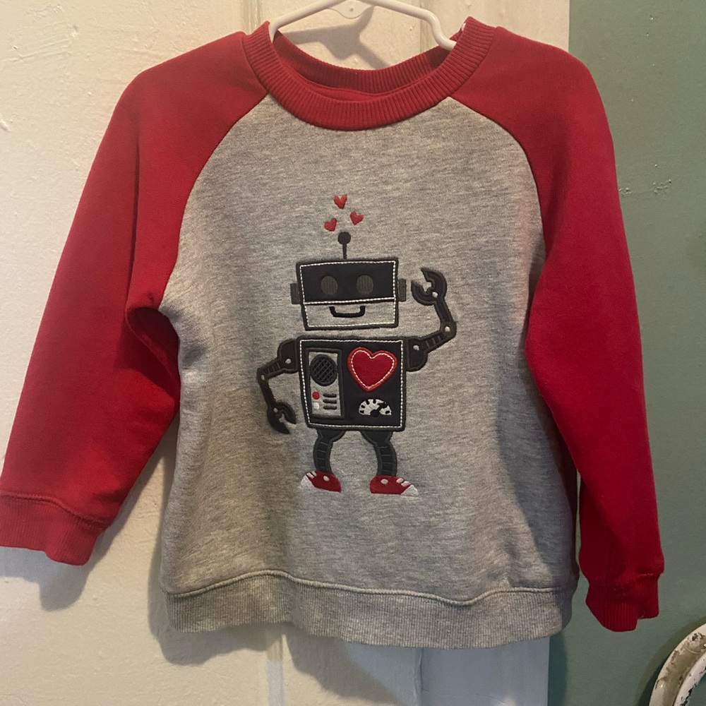 Red sweatshirt (used but in perfect conditions)